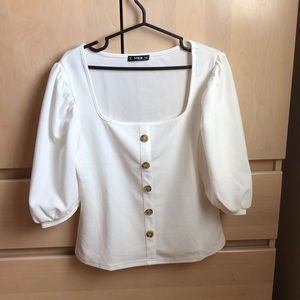 White Shirt with buttons. Mid-Sleeve.